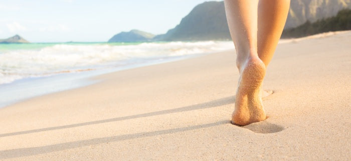 Gambe gonfie e pesanti: gli oli essenziali per alleggerirle